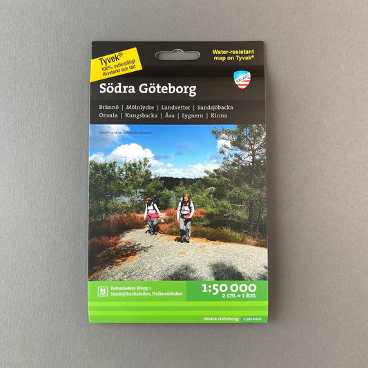 Photo of front of packaging for a map of Södra Göteborg on a grey background