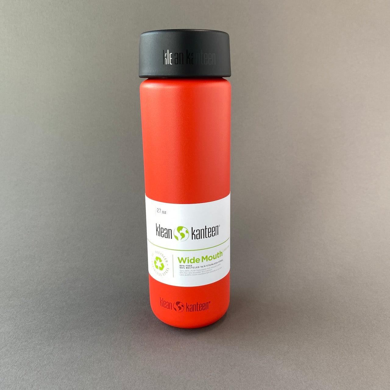 Photo of  tiger lily 800ml wide mouth water bottle on grey background.  Tiger lily is really pretty bright red.