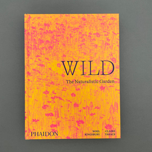 A book called "Wild The Naturalistic garden" with a yellow and pink flower field as the cover